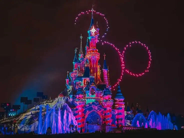 Disney Tales of Magic nighttime show with drones back above the castle